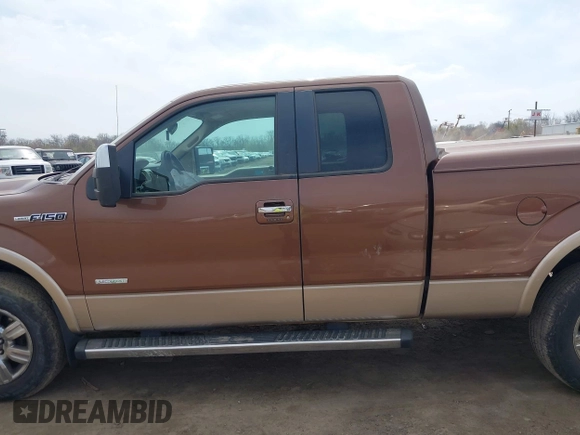 2011 Ford F-150 XL with VIN 1FTFX1ET9BKD67310, listed as a IAAI auction lot 42016119 with 147,114 mi miles. Bid and sale history available at carsss.com. Image 14.