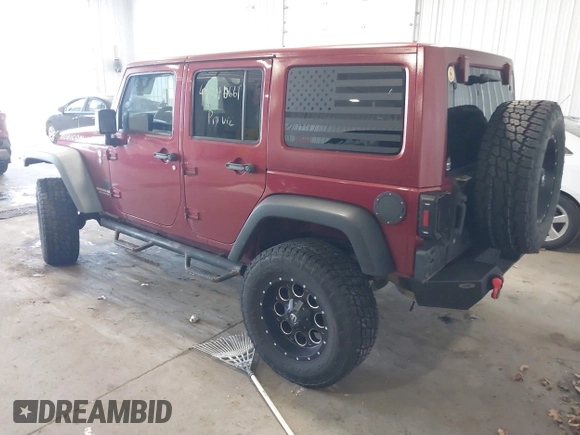 2011 Jeep Wrangler Unlimited Rubicon with VIN 1J4BA6H18BL584486, listed as a IAAI auction lot 42340661 with 152,896 mi miles and . Bid and sale history available at DreamBid. Image 3.