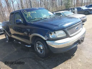 1999 Ford F-150 XL with VIN 2FTRX07L3XCA60067, listed as a IAAI auction lot 41887212 with 176,034 mi miles. Bid and sale history available at carsss.com. Image 1.