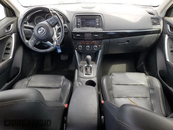 2015 Mazda CX-5 Grand Touring with VIN JM3KE4DY9F0536771, listed as a Copart auction lot 51801775 with 88,529 mi miles and Salvage Title. Bid and sale history available at DreamBid. Image 8.