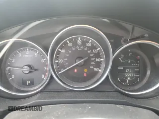 2017 Mazda CX-5 Touring z VIN JM3KFBCL2H0129000, wystawiony jako Copart lot #52107005 z przebiegiem 55 411 mil mil oraz Szkody całkowita. Historia ofert i sprzedaży dostępna na DreamBid. Obrazek 9.