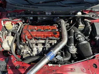 2012 Mitsubishi Lancer Evolution GSR z VIN JA32W8FV0CU019216, wystawiony jako Copart lot #75898944 z przebiegiem 129 387 mil mil oraz Tytuł czysty. Historia ofert i sprzedaży dostępna na DreamBid. Obrazek 7.