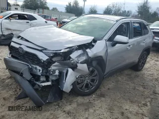 2023 Toyota RAV4 Hybrid XLE Premium z VIN JTMB6RFV8PD115723, wystawiony jako Copart lot #88005175 z przebiegiem 18 363 mil mil oraz Szkoda całkowita • Salvage title. Historia ofert i sprzedaży dostępna na DreamBid. Obrazek 1.