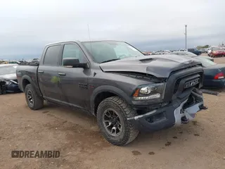 2017 Ram 1500 Rebel z VIN 1C6RR7YT0HS534465, wystawiony jako IAAI lot #41240431 z przebiegiem 125 886 mil mil oraz . Historia ofert i sprzedaży dostępna na DreamBid. Obrazek 13.