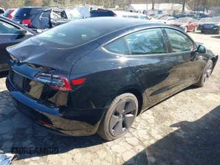 2023 Tesla Model 3 with VIN 5YJ3E1EA2PF482536, listed as a IAAI auction lot 41858110 with 6,298 mi miles. Bid and sale history available at carsss.com. Image 4.