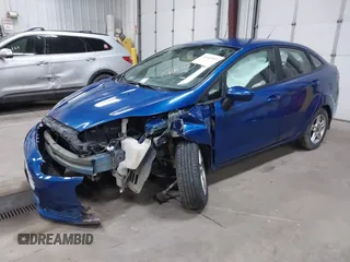 2019 Ford Fiesta SE z VIN 3FADP4BJXKM118427, wystawiony jako IAAI lot #41643927 z przebiegiem 109 617 mil mil oraz . Historia ofert i sprzedaży dostępna na DreamBid. Obrazek 2.