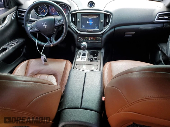 2015 Maserati Ghibli z VIN ZAM57XSA7F1148872, wystawiony jako Copart lot #48454165 z przebiegiem 72 232 mil mil oraz Szkoda całkowita • Salvage title. Historia ofert i sprzedaży dostępna na DreamBid. Obrazek 8.