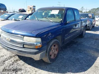 1999 Chevrolet Silverado 1500 LS with VIN 2GCEC19V1X1144026, listed as a IAAI auction lot 41398552 with 216,068 mi miles. Bid and sale history available at carsss.com. Image 2.