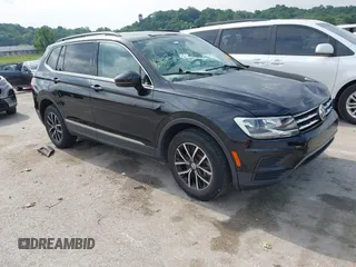 2021 Volkswagen Tiguan SE with VIN 3VV2B7AX0MM088138, listed as a IAAI auction lot 42390462 with 49,222 mi miles and . Bid and sale history available at DreamBid. Image 1.