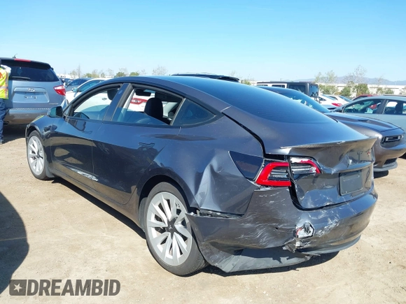 2021 Tesla Model 3 Long Range with VIN 5YJ3E1EB9MF997442, listed as a IAAI auction lot 41759875 with 87,059 mi miles. Bid and sale history available at carsss.com. Image 6.