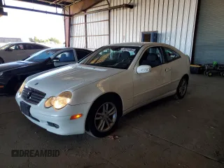 2003 Mercedes-Benz C 230 Kompressor with VIN WDBRN40J83A432695, listed as a Copart auction lot 84214584 with 131,550 mi miles and Salvage title. Bid and sale history available at DreamBid. Image 1.