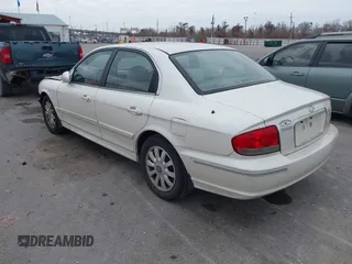 2002 Hyundai Sonata GLS with VIN KMHWF35HX2A523401, listed as a IAAI auction lot 41502680 with 176,283 mi miles. Bid and sale history available at carsss.com. Image 3.