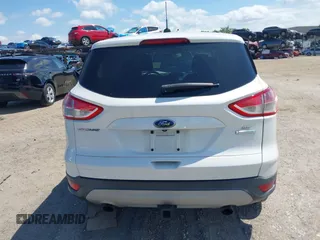 2014 Ford Escape SE with VIN 1FMCU0G93EUD22536, listed as a IAAI auction lot 42045733 with 145,983 mi miles. Bid and sale history available at carsss.com. Image 16.
