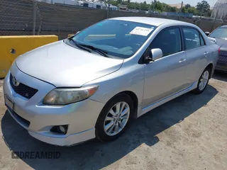 2010 Toyota Corolla z VIN 2T1BU4EE3AC500511, wystawiony jako IAAI lot #42731216 z przebiegiem 143 255 mil mil oraz . Historia ofert i sprzedaży dostępna na DreamBid. Obrazek 2.