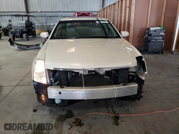 2007 Cadillac STS z VIN 1G6DW677170153246, wystawiony jako Copart lot #59531015 z przebiegiem 65 092 mil mil oraz Szkoda całkowita • Salvage title. Historia ofert i sprzedaży dostępna na DreamBid. Obrazek 5.