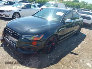 2013 Audi S6 Prestige z VIN WAUF2AFC9DN157673, wystawiony jako IAAI lot #42200162 z przebiegiem 129 670 mil mil oraz . Historia ofert i sprzedaży dostępna na DreamBid. Obrazek 2.