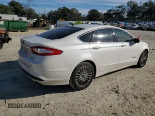 2013 Ford Fusion Titanium Hybrid with VIN 3FA6P0RU2DR277773, listed as a Copart auction lot 85990424 with 215,289 mi miles and Non Repairable. Bid and sale history available at DreamBid. Image 3.