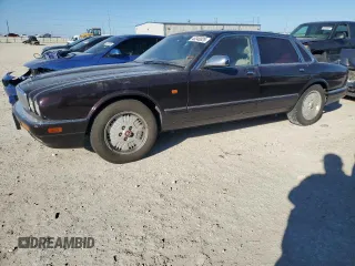 1995 Jaguar XJ with VIN SAJKX1743SC734007, listed as a Copart auction lot 46340825 with 130,115 mi miles and Salvage Title. Bid and sale history available at DreamBid. Image 1.