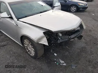 2012 Cadillac CTS z VIN 1G6DA5E50C0152626, wystawiony jako IAAI lot #41101077 z przebiegiem 104 324 mil mil oraz . Historia ofert i sprzedaży dostępna na DreamBid. Obrazek 6.