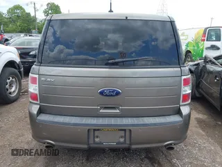 2014 Ford Flex SE z VIN 2FMGK5B81EBD02360, wystawiony jako IAAI lot #42383070 z przebiegiem 173 643 mil mil oraz . Historia ofert i sprzedaży dostępna na DreamBid. Obrazek 16.