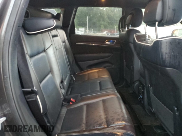2017 Jeep Grand Cherokee Overland with VIN 1C4RJFCG4HC730861, listed as a Copart auction lot 62918825 with 77,228 mi miles and Salvage title. Bid and sale history available at DreamBid. Image 11.