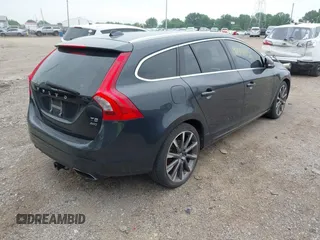 2015 Volvo V60 with VIN YV1612SB3F1192139, listed as a IAAI auction lot 42471036 with 104,935 mi miles and . Bid and sale history available at DreamBid. Image 4.