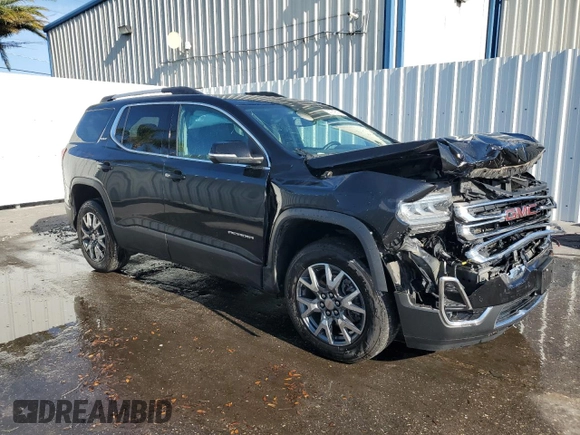 2023 GMC Acadia SLT with VIN 1GKKNML43PZ152834, listed as a Copart auction lot 49820205 with 44,932 mi miles and Salvage Title. Bid and sale history available at DreamBid. Image 4.