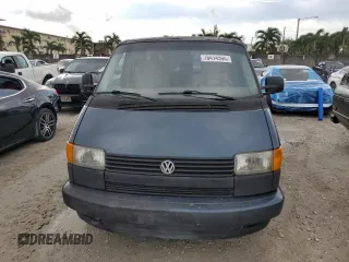 1993 Volkswagen EuroVan с VIN WV2MC0707PH010911, выставлен на аукционе Copart как лот 78414594 с пробегом 191 174 миль миль и Чистый • Clean title. История ставок и продаж доступна на DreamBid. Изображение 5.
