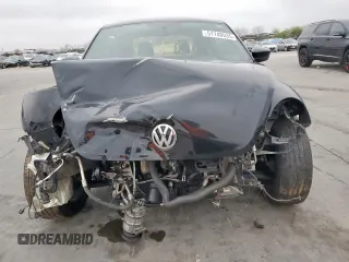 2013 Volkswagen Beetle Entry with VIN 3VWFP7AT8DM630744, listed as a Copart auction lot 51140035 with 118,649 mi miles and Clean Title. Bid and sale history available at DreamBid. Image 5.