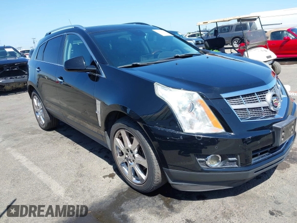 2012 Cadillac SRX Performance Collection z VIN 3GYFNBE30CS659973, wystawiony jako IAAI lot #42555119 z przebiegiem 141 842 mil mil oraz . Historia ofert i sprzedaży dostępna na DreamBid. Obrazek 1.