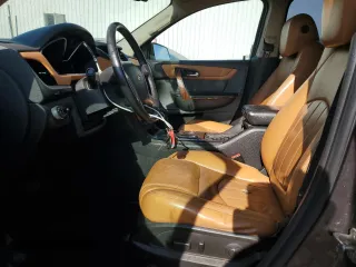 2014 Chevrolet Traverse LTZ z VIN 1GNKVJKD5EJ212952, wystawiony jako Copart lot #54815805 z przebiegiem 185 329 mil mil oraz Czysty tytuł • Clean title. Historia ofert i sprzedaży dostępna na DreamBid. Obrazek 7.