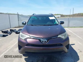 2016 Toyota RAV4 LE with VIN 2T3ZFREV4GW284902, listed as a IAAI auction lot 42054633 with 117,463 mi miles and . Bid and sale history available at carsss.com. Image 13.