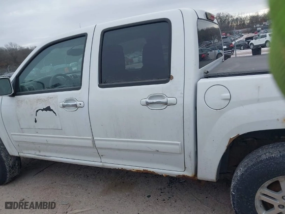2012 Chevrolet Colorado LT w/1LT with VIN 1GCHTCFEXC8144451, listed as a IAAI auction lot 41394551 with 204,208 mi miles. Bid and sale history available at carsss.com. Image 14.