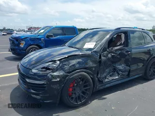 2016 Porsche Cayenne GTS z VIN WP1AD2A25GLA70430, wystawiony jako IAAI lot #42547008 z przebiegiem 108 374 mil mil oraz . Historia ofert i sprzedaży dostępna na DreamBid. Obrazek 6.