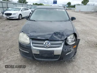 2009 Volkswagen Jetta SE with VIN 3VWRM71K49M172348, listed as a Copart auction lot 60603895 with 129,515 mi miles and Salvage title. Bid and sale history available at DreamBid. Image 5.