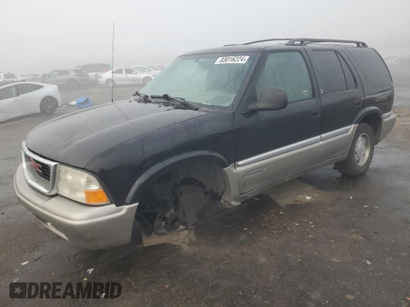 1998 GMC Jimmy SL with VIN 1GKCS13W8W2572514, listed as a Copart auction lot 83016224 with 85,044 mi miles and Salvage Title. Bid and sale history available at carsss.com. Image 1.