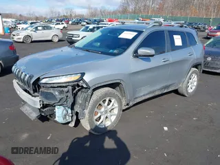 2014 Jeep Cherokee Altitude with VIN 1C4PJMCB5EW167961, listed as a IAAI auction lot 41660440 with 88,705 mi miles and . Bid and sale history available at DreamBid. Image 2.