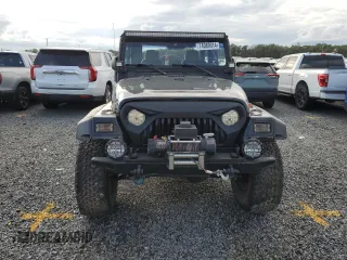 2004 Jeep Wrangler Rubicon with VIN 1J4FA69S54P769356, listed as a Copart auction lot 74089914 with 0 mi miles and Salvage Title. Bid and sale history available at carsss.com. Image 5.