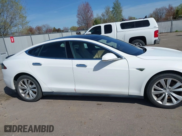2014 Tesla Model S P85D with VIN 5YJSA1H20EFP63761, listed as a IAAI auction lot 41980472 with 109,164 mi miles and . Bid and sale history available at DreamBid. Image 13.