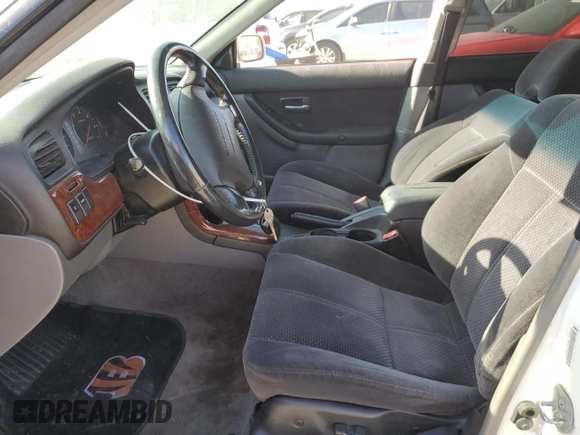2004 Subaru Legacy Sedan (Natl) L with VIN 4S3BE625747207214, listed as a Copart auction lot 57332204 with 208,106 mi miles and Salvage Title. Bid and sale history available at carsss.com. Image 7.