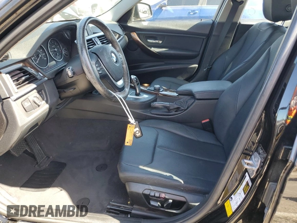 2014 BMW 3 Series 328i with VIN WBA3C1G56ENR49944, listed as a Copart auction lot 60330895 with 50,692 mi miles and Salvage title. Bid and sale history available at DreamBid. Image 7.