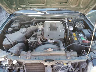 2000 Mitsubishi Montero LS z VIN JA4MT31H0YP015030, wystawiony jako Copart lot #83232584 z przebiegiem 75 294 mil mil oraz Szkoda całkowita • Salvage title. Historia ofert i sprzedaży dostępna na DreamBid. Obrazek 13.
