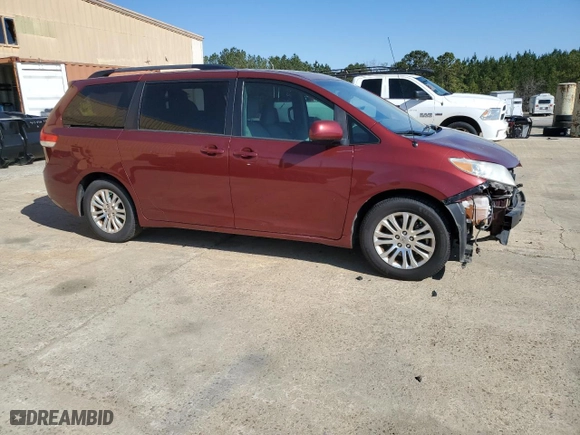 2014 Toyota Sienna XLE with VIN 5TDYK3DC4ES444487, listed as a Copart auction lot 50873395 with 230,650 mi miles and Salvage Title. Bid and sale history available at carsss.com. Image 4.