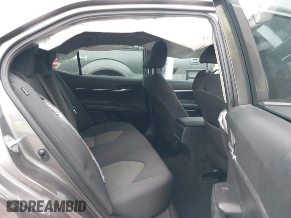 2023 Toyota Camry LE z VIN 4T1R11AK1PU169839, wystawiony jako IAAI lot #42140135 z przebiegiem 10 808 mil mil oraz . Historia ofert i sprzedaży dostępna na DreamBid. Obrazek 8.