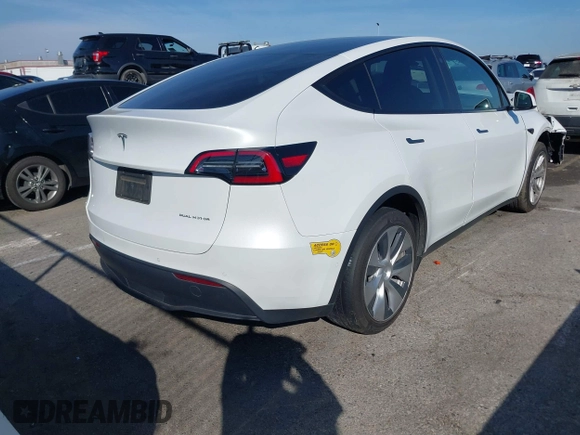 2022 Tesla Model Y Long Range z VIN 7SAYGDEE8NF374636, wystawiony jako IAAI lot #41545669 z przebiegiem 41 965 mil mil oraz . Historia ofert i sprzedaży dostępna na DreamBid. Obrazek 4.