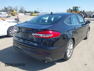 2020 Ford Fusion SE with VIN 3FA6P0HD8LR171120, listed as a IAAI auction lot 42004093 with 35,941 mi miles and . Bid and sale history available at DreamBid. Image 4.