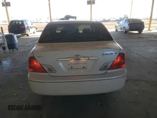 2001 Toyota Avalon XL with VIN 4T1BF28B71U123194, listed as a Copart auction lot 84050604 with 199,807 mi miles and Salvage Title. Bid and sale history available at DreamBid. Image 6.