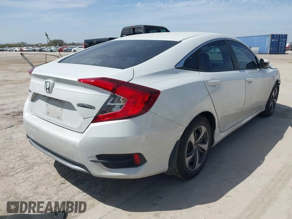 2019 Honda Civic Sedan LX with VIN 19XFC2F64KE040214, listed as a IAAI auction lot 41753300 with 74,285 mi miles. Bid and sale history available at carsss.com. Image 4.