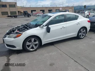 2014 Acura ILX with VIN 19VDE1F34EE000679, listed as a IAAI auction lot 41799014 with 136,514 mi miles. Bid and sale history available at carsss.com. Image 17.