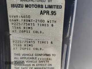 1995 Isuzu Rodeo LS with VIN 4S2CG58V9S4342391, listed as a Copart auction lot 71076344 with 220,708 mi miles and Salvage Title. Bid and sale history available at carsss.com. Image 14.